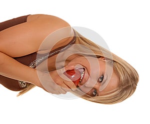 Lovely Blond Girl eating an apple