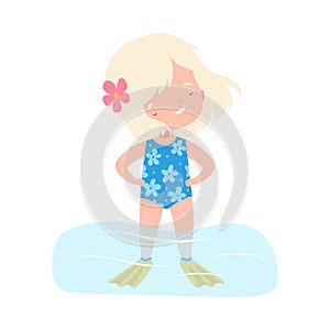 Lovely Blonde Girl Wearing Blue Swimsuit Standing in Water, Kids Summer Activities, Adorable Child Having Fun on Beach