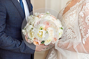 Lovely bouquet of pink orchids, chrysanthemums and hortensias mixed with pink roses and white eustomas. photo