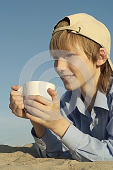 Lovely boy posing outdoors