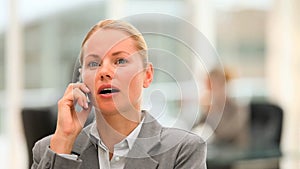 Lovely business woman speaking on the phone