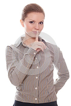 Lovely businesswoman showing quietly sign