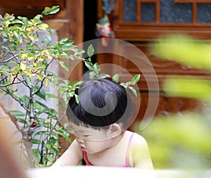 Lovely Chinese baby girl play at home