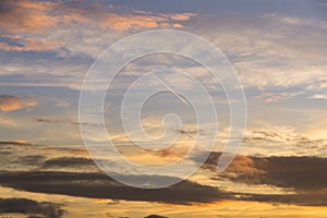 Lovely clouds over the city and houses or park and meadow, during sunrise or sunset.