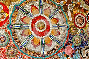 Lovely colorful mosaic designs made with pottery shards and glass gems, at Pha Sorn Kaew, in Khao Kor, Phetchabun, Thailand.