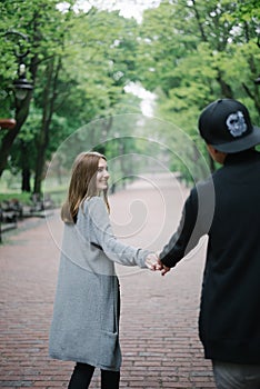 Lovely cople running and play in the park