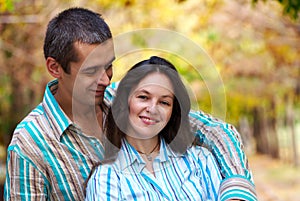 Lovely couple in autumn park