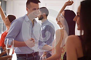 Lovely couple dancing together at party