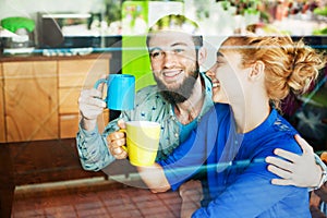 Lovely couple drinking tea together and talking