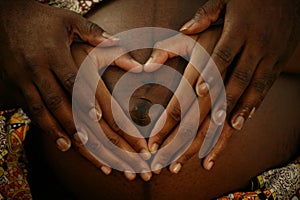 Lovely Couple's Hand On Pregnant Belly