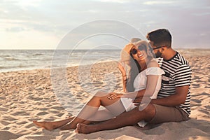 Lovely couple spending time together on beach