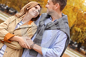 Lovely couple spending time together in park.