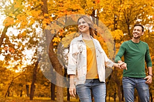 Lovely couple spending time together in park.