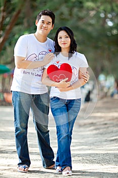 Lovely couple standing on the beach