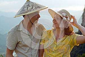 Lovely couple at sunset on top of the Chinese mountain of Moon Hill