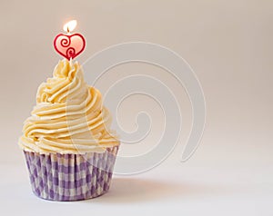 Lovely cupcake and candle photo