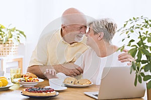 Lovely elderly couple hugging