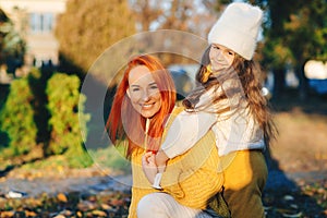 Lovely family laughing on autumn walk. Autumn holidays, lifestyle