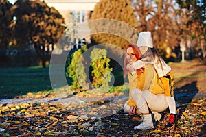 Lovely family laughing on autumn walk. Autumn holidays, lifestyle