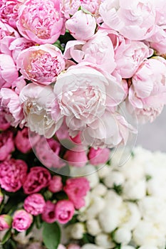 Lovely flowers in glass vase. Beautiful bouquet of pink peonies . Floral composition, scene, daylight. Wallpaper