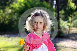 Lovely girl with a flower photo