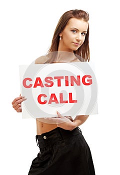 Lovely girl holding casting call board