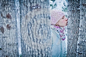 Lovely Girl Kissing a Tree in Forest