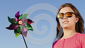 Lovely girl with windmill toy