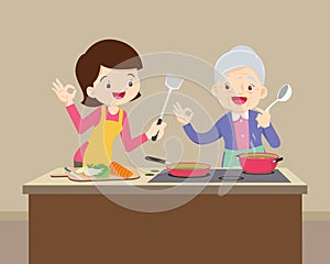 Lovely grandmother and woman cooking in kitchen okay gesture