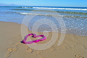 A Lovely Heart Shaped Christmas Decoration On The Beach