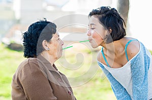 Lovely hispanic grandmother and granddaughter