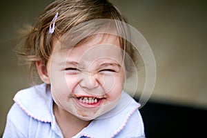 Lovely little girl making funny face