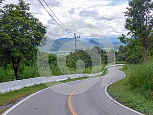 A mountain road in northern Thailand offers scenic views