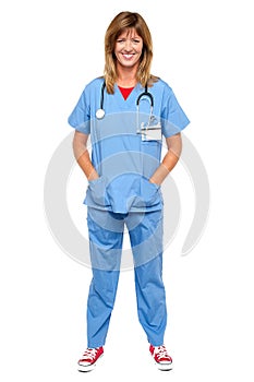 Lovely medical expert with hands in pocket