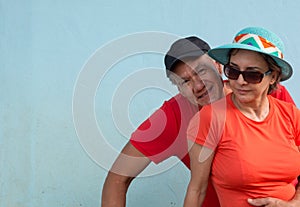 Lovely Older Couple sitting on the Front Porch