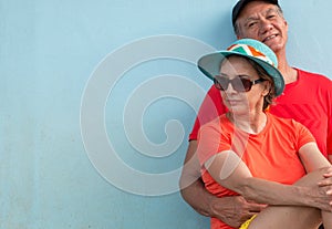 Lovely Older Couple sitting on the Front Porch