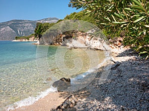 Lovely pebbly beach with crystal clear sea of the Ithaca island, Molos Gulf, Ionian Sea, Greece