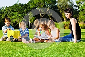 Lovely preschoolers with books