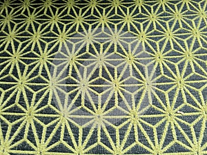 Lovely repeated pattern with thread on cloth