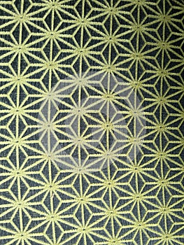 Lovely repeated pattern with thread on cloth