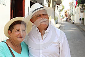Lovely senior Hispanic couple outdoors close up