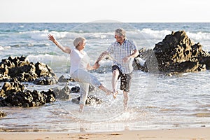 Lovely senior mature couple on their 60s or 70s retired walking