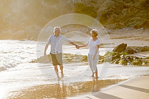 Lovely senior mature couple on their 60s or 70s retired walking