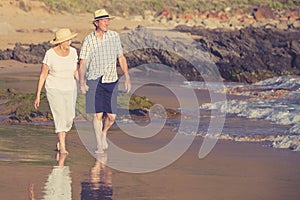 Lovely senior mature couple on their 60s or 70s retired walking