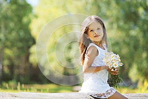 Lovely spring girl with flowers