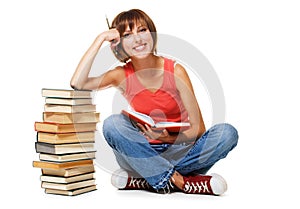 Lovely student with a stack of books