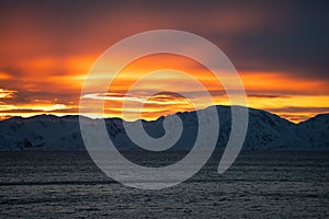 A lovely sunset over the sea and mountains