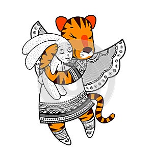 Lovely tiger with wings in beautiful clothes with a plush rabbit in the paws.