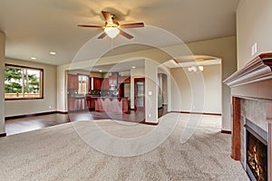 Lovely unfurnished living room with carpet. photo