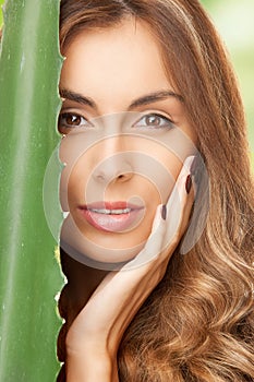 Lovely woman with aloe vera